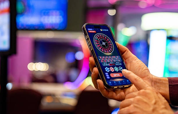 elang77 mobile app interface showing live casino tables and sportsbook menu